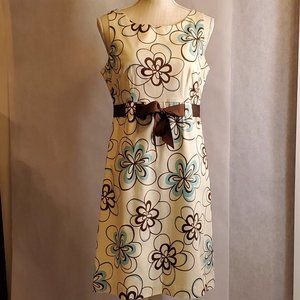 Beautiful dress with jaunty blue & brown flowers and pretty little ribbon